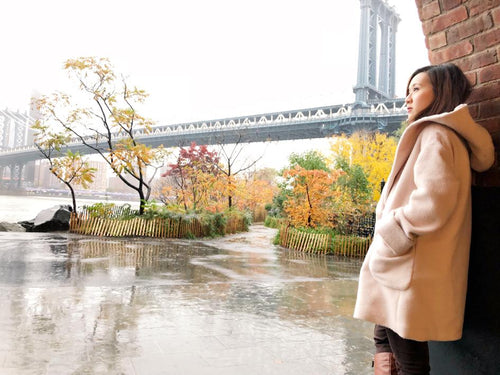 Adelia standing and looking into the distance