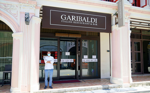 Chef Roberto Galetti, Executive Chef, Managing Director, and owner in front of award winning and Michelin starred Garibaldi Italian Restaurant in Purvis Street