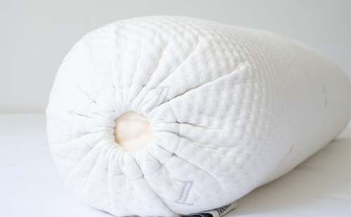 close up white pillow on bed