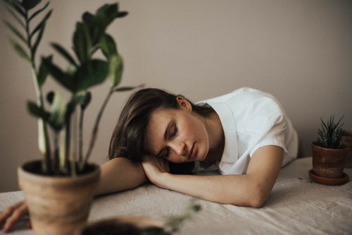 Girl with insomnia and anxiety struggling to sleep