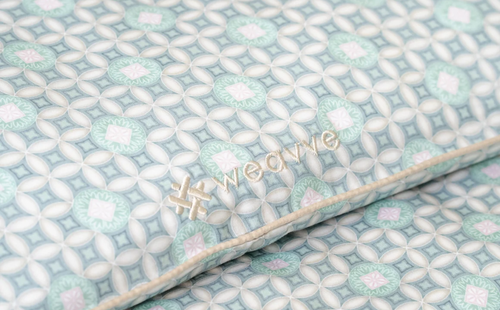Jade Blossoms Signature TENCEL™ sheet from Weavve Home