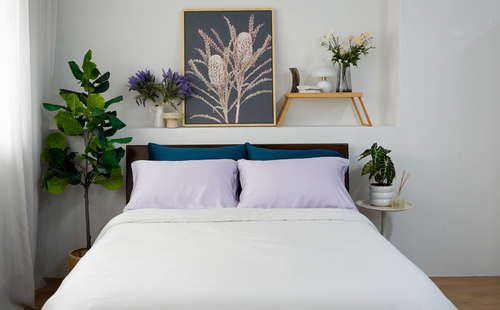 bedding mix in teal white purple with decor