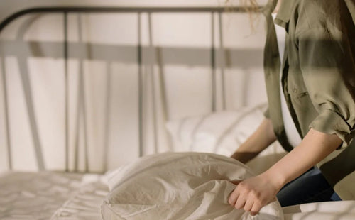 girl take care of mattress