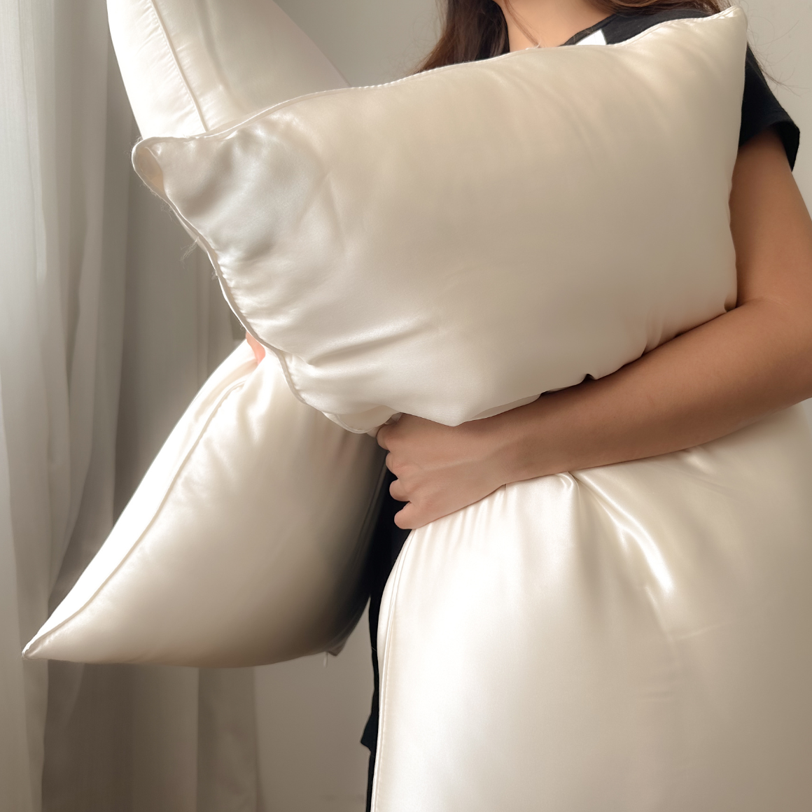 Best hypoallergenic silk pillow for sleep. Filled with 100% Silk Floss inside a layer of Feather Silk Cotton. Singapore Weavve Home Silk Pillow Collection.