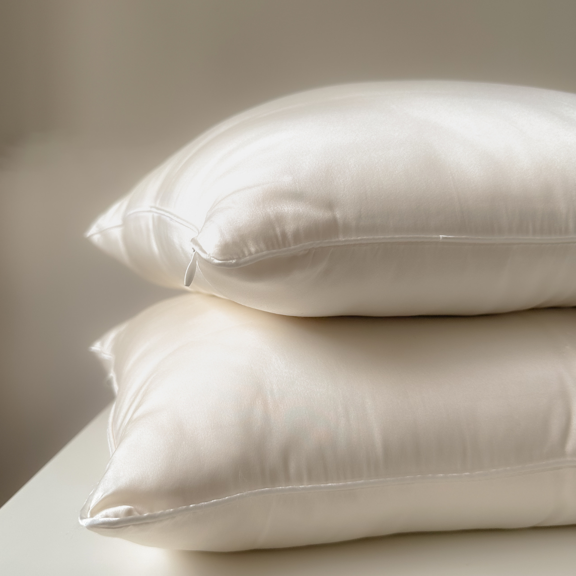 Best hypoallergenic silk pillow for sleep. Filled with 100% Silk Floss inside a layer of Feather Silk Cotton. Singapore Weavve Home Silk Pillow Collection.