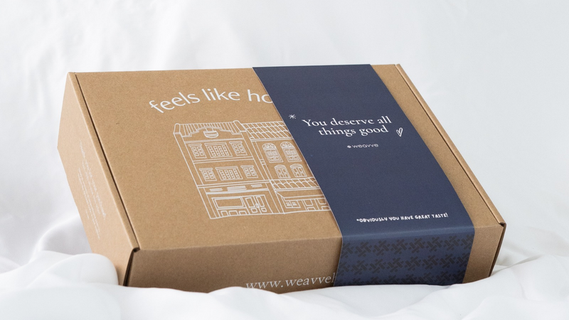 Weavve Christmas gift wrapped in a box