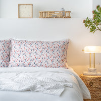 Weavve Home x SCENE SHANG Tencel Bed sheets collection singapore. Featuring SCENE SHANG Love is a Warm Brew print. TENCEL pillowcase pair in pink  prints - Love is a Warm Brew print by SCENE SHANG. Shop tencel bed sheets online Singapore at Weavve Home.